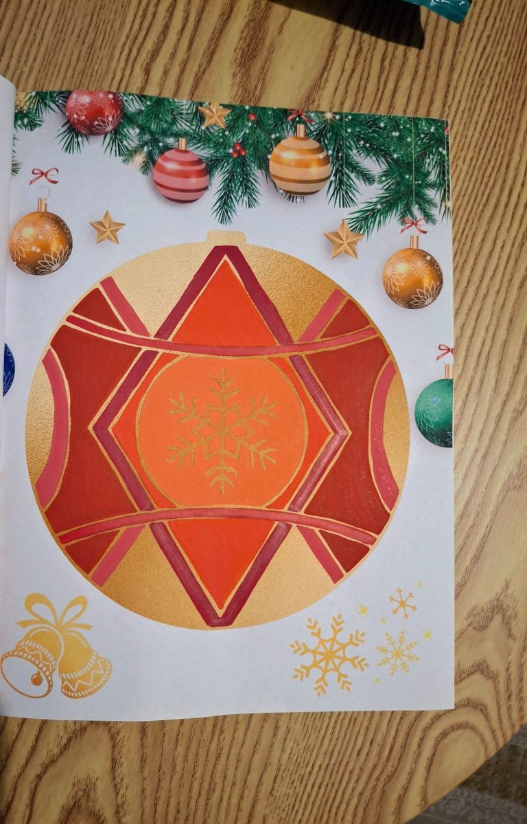 Livre de Mandalas et Dessins " L' esprit de Noël" Adultes/Ados Dessins de Noël avec des ornements colorés et un motif géométrique central.